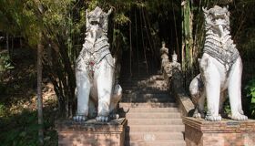 2 Lion Statues at the Stairs of the Temple